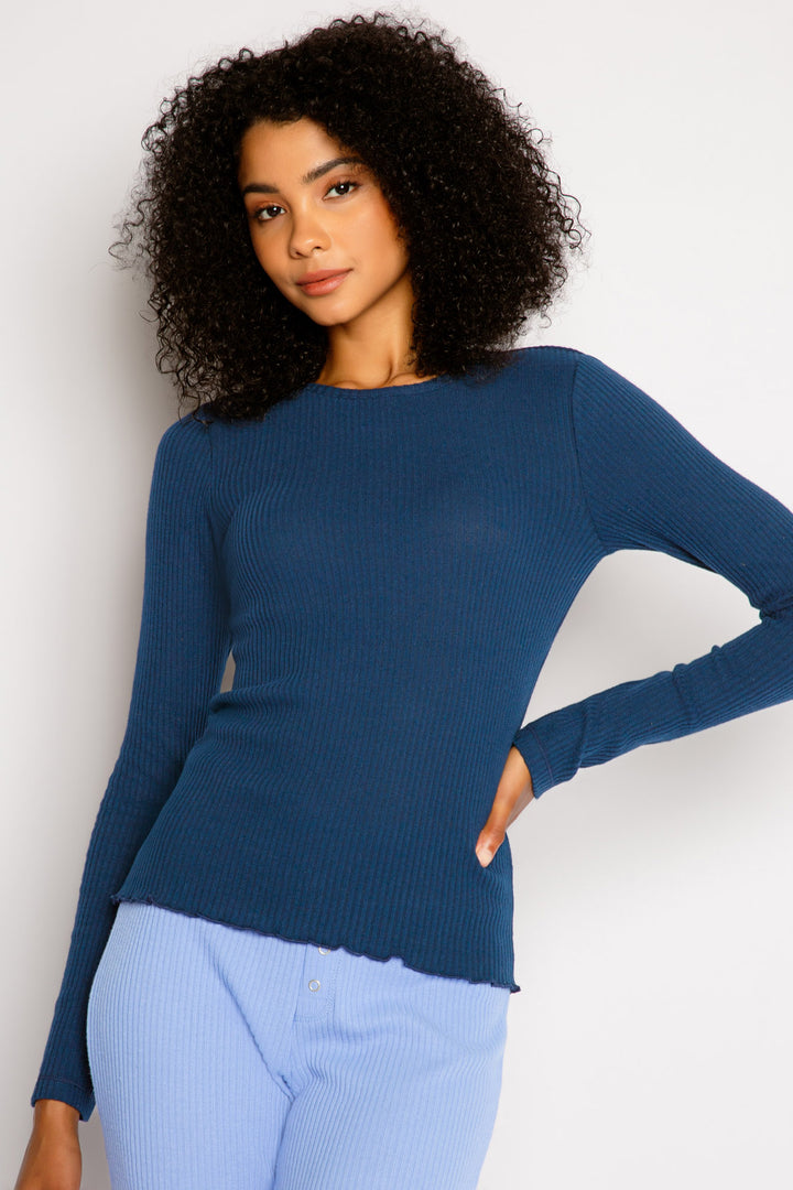 Navy fitted long sleeve rib top in Repreve x Reloved recycled soft knit with merrow stitched hem. (7325665394788)