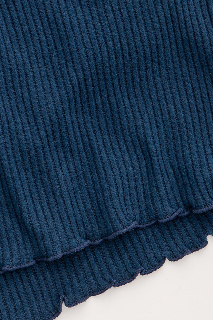 Navy rib sleep short in Repreve x Reloved recycled soft knit. Mini snap fly & curly merrow hem. (7325665624164)