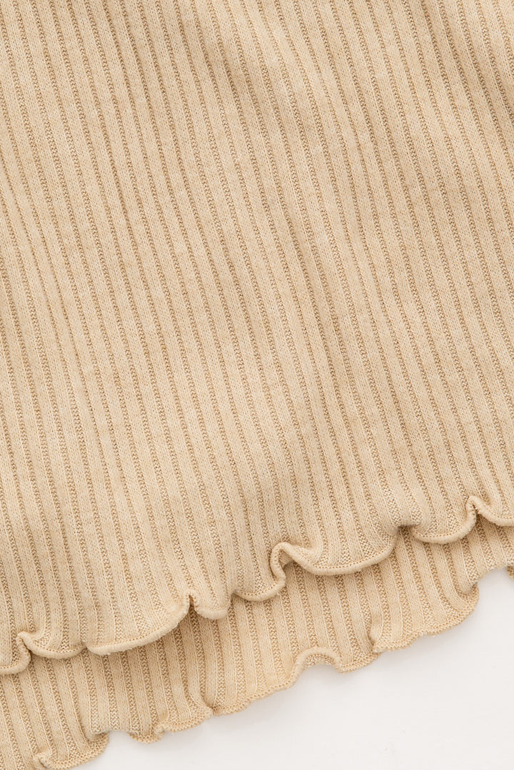 Tan rib sleep short in Repreve x Reloved recycled soft knit. Mini snap fly & curly merrow hem. (7325665722468)