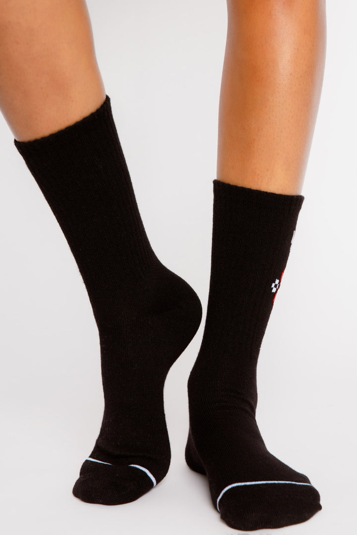 Black ribbed cozy socks with floral embroidery on sides. Gripper print on soles for non-skid. (7325666115684)