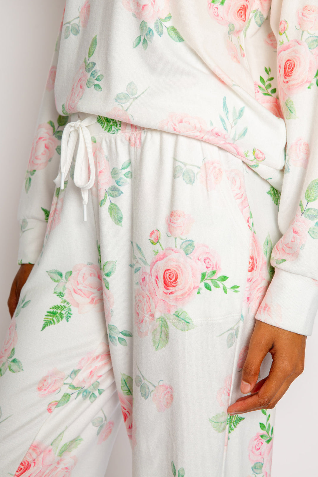 Pajama set in ivory-pink rose-floral printed peachy knit. Pajama top & jogger with pockets & tie-waist. (7325666377828)