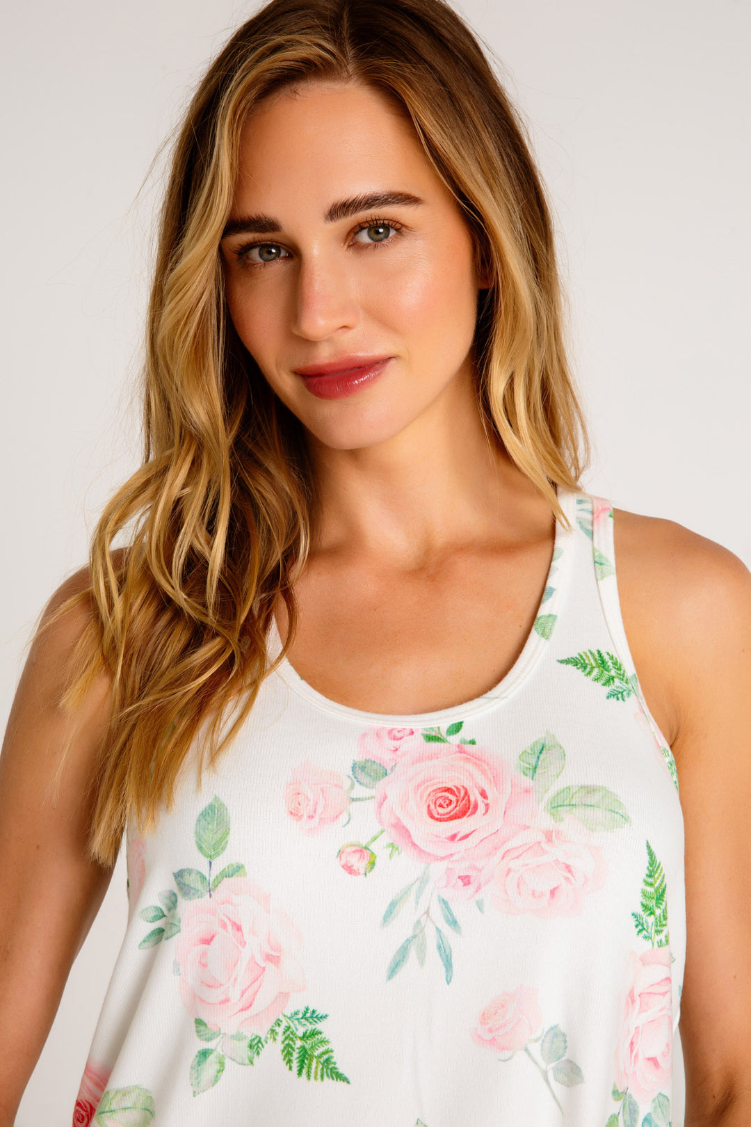 Sleep tank top in ivory-pink rose-floral printed peachy knit. Relaxed fit with racer back. (7325666410596)