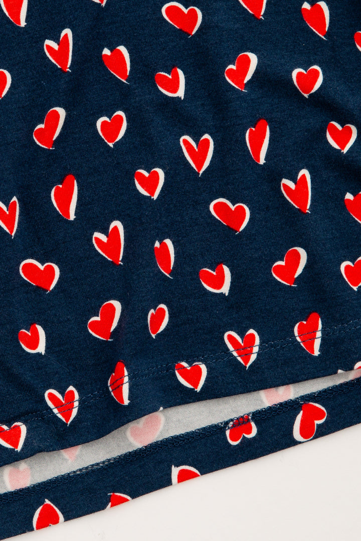 Navy blue heart-printed night shirt in modal with aloe-cooling finish. Button-front with red piping. (7325667000420)