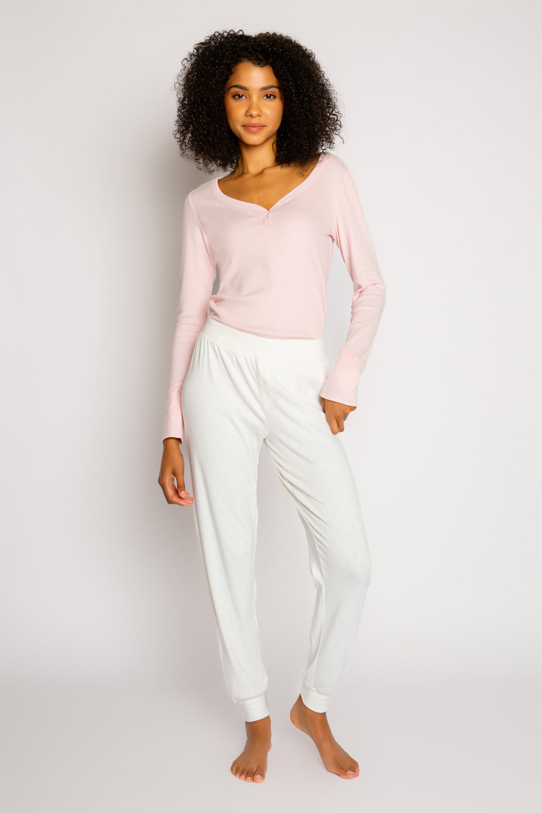 Ivory jammie pant in soft pointelle knit wtih faux button-fly. Semi-fitted with banded cuff. (7325667983460)