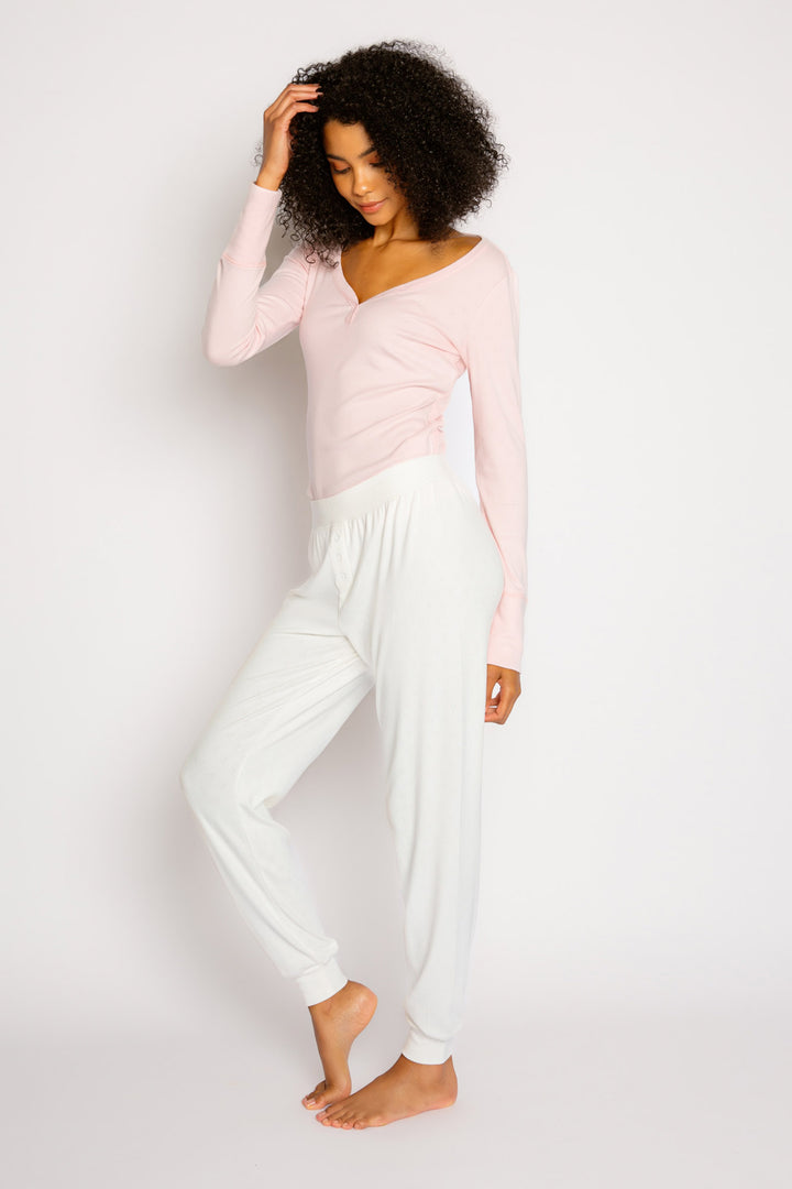 Ivory jammie pant in soft pointelle knit wtih faux button-fly. Semi-fitted with banded cuff. (7325667983460)