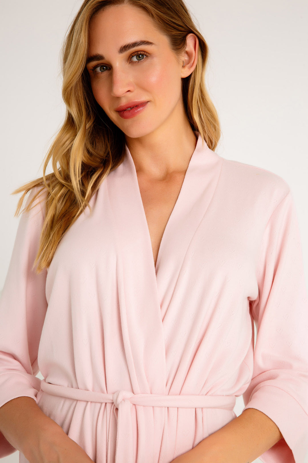 Light pink robe in brushed pointelle knit with self belt & 3/4 sleeve. (7325668081764)