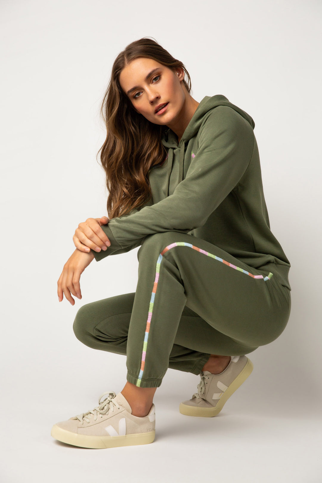Smooth terry lounge set in pine green with multi-stitching at seams. Pullover hoody & jogger pant. (7325668278372)