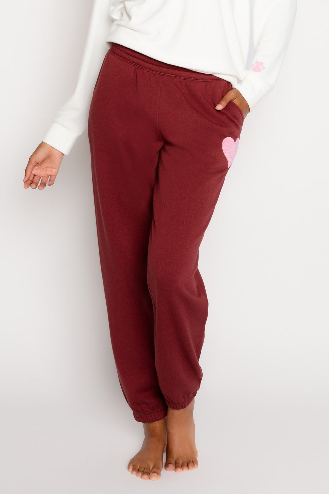 Burgundy fleece jogger pant. Tie waist wiht pink applique on hip. (7325668540516)