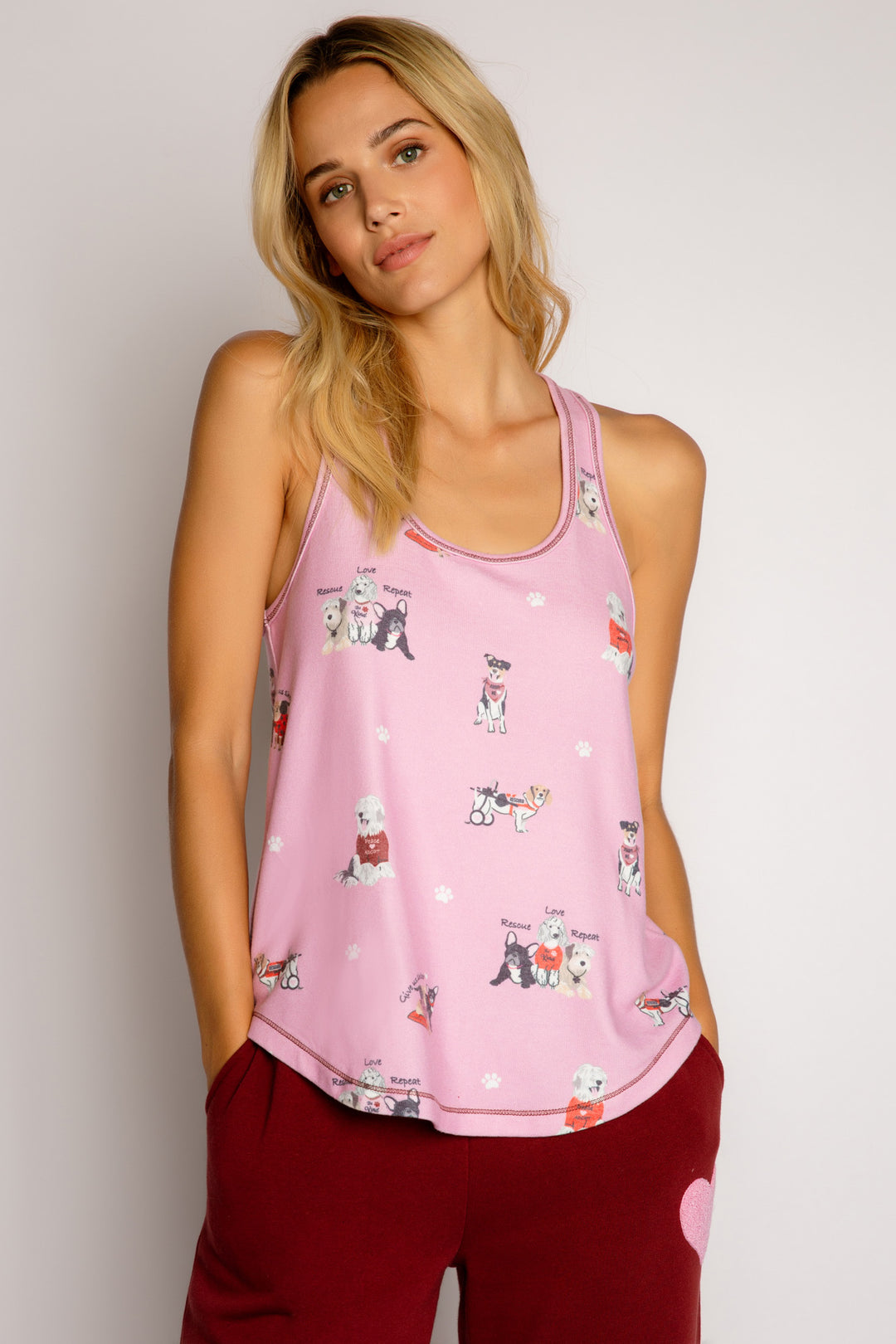 Sleep tank top in peachy knit in pink rescue-dog theme print. Racer-back with relaxed fit. (7325668802660)