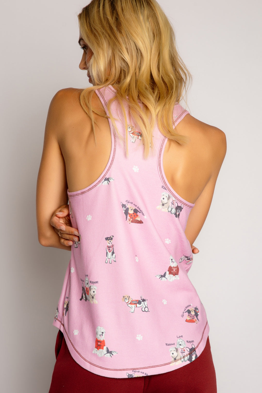 Sleep tank top in peachy knit in pink rescue-dog theme print. Racer-back with relaxed fit. (7325668802660)