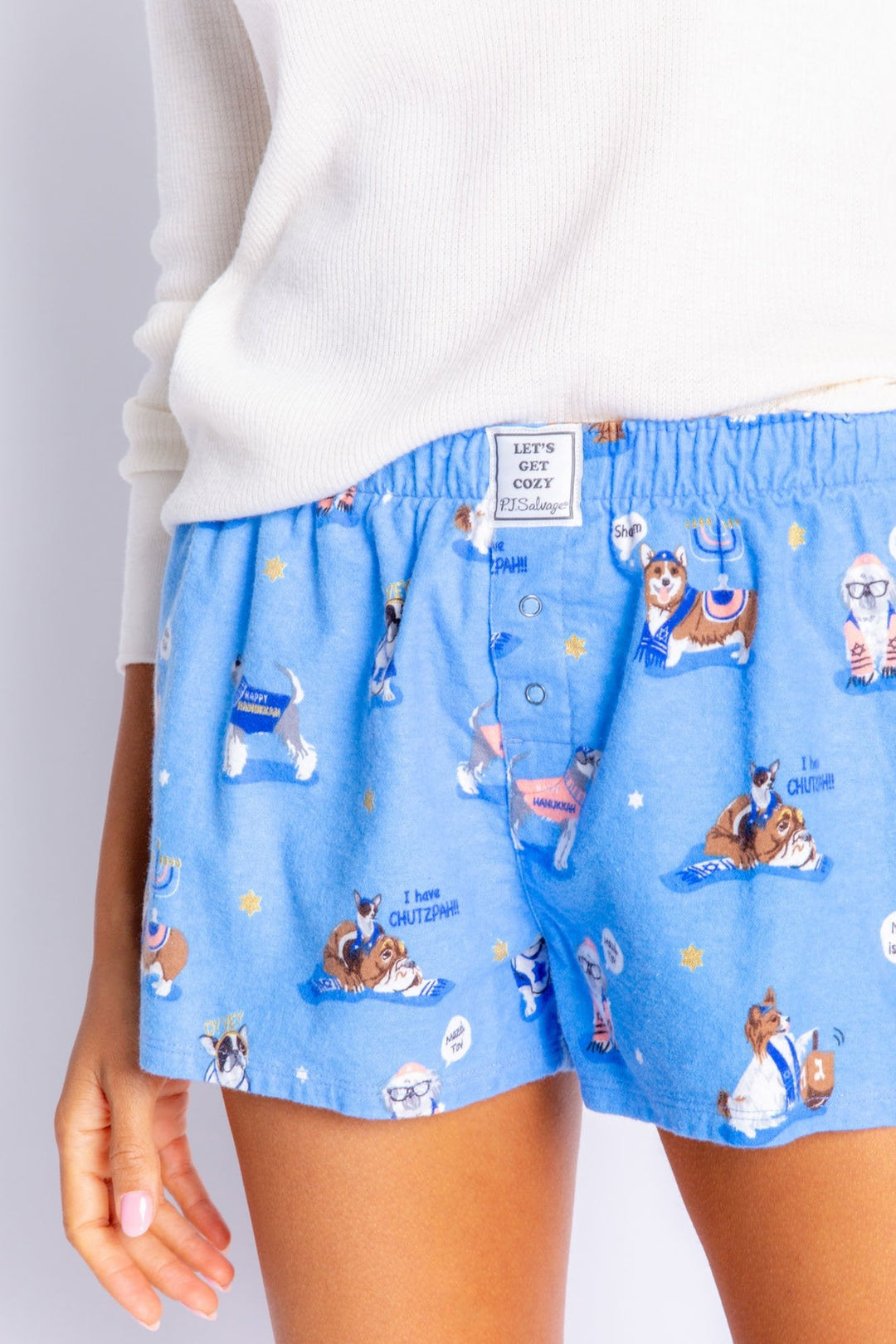 Light blue straight leg flannel shorts in Hanukkah themed dog print. Elastic waist and faux snap fly. (6576915513444) (7000958009444)
