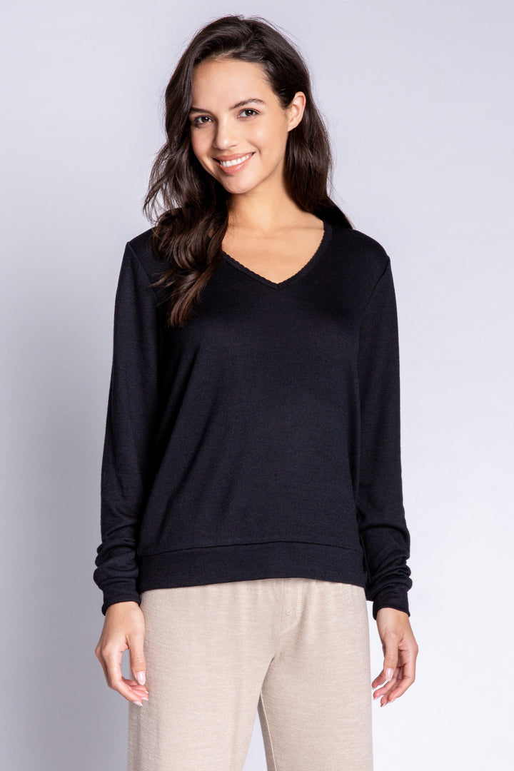 Black V-neck top in recycled REPREVE® jersey. Picot trim at neck, with a clean fit & banded cuffs. (6612549533796)