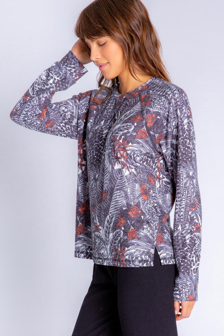 Peachy lounge top in exotic floral-feather print. Relaxed fit pullover with banded cuffs. (6839647567972)