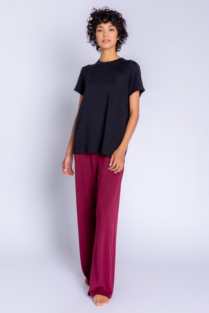 Soft Repreve® recycled knit short-sleeve tee in black. (6612550549604)