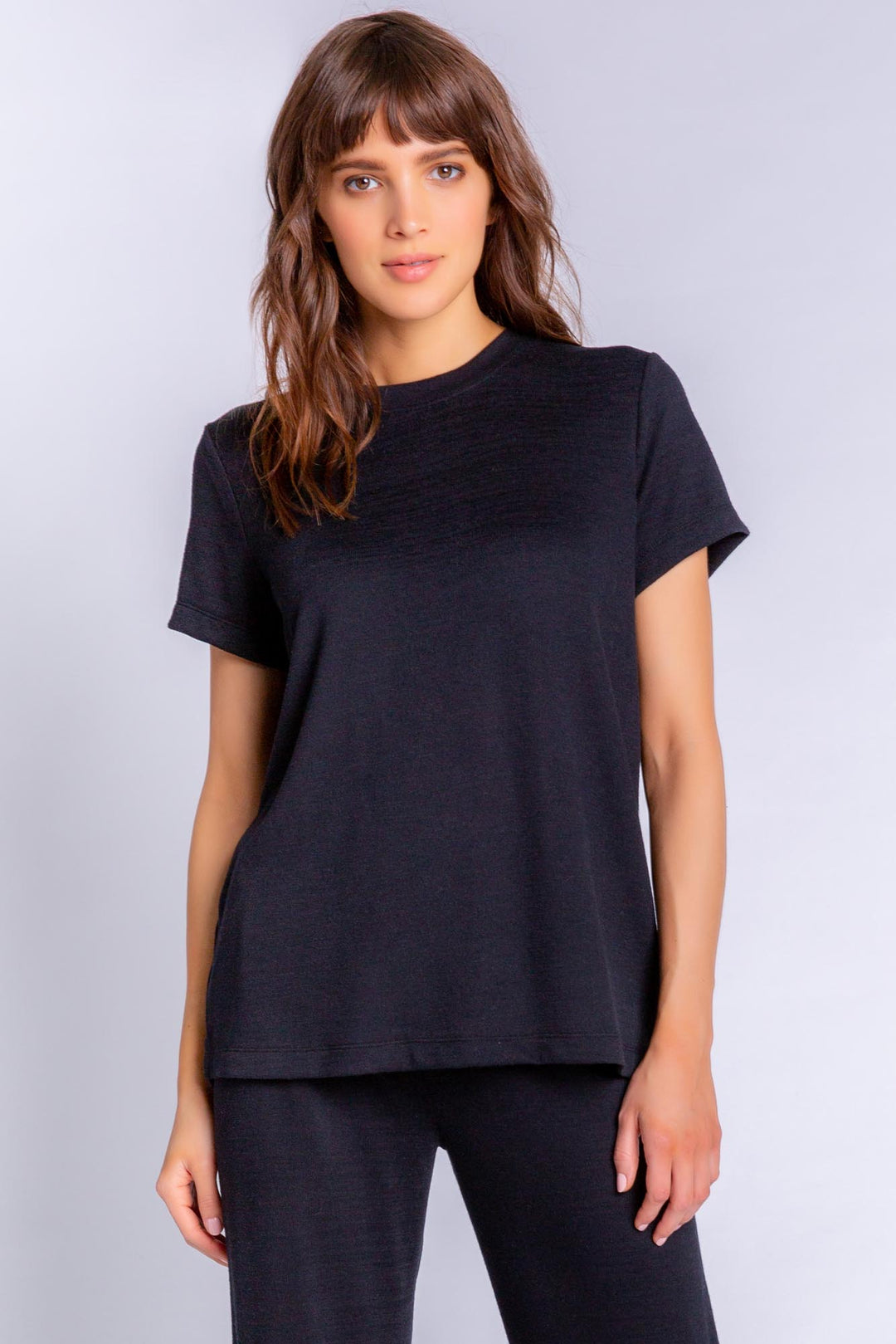 Soft Repreve® recycled knit short-sleeve tee in black. (6612550549604)